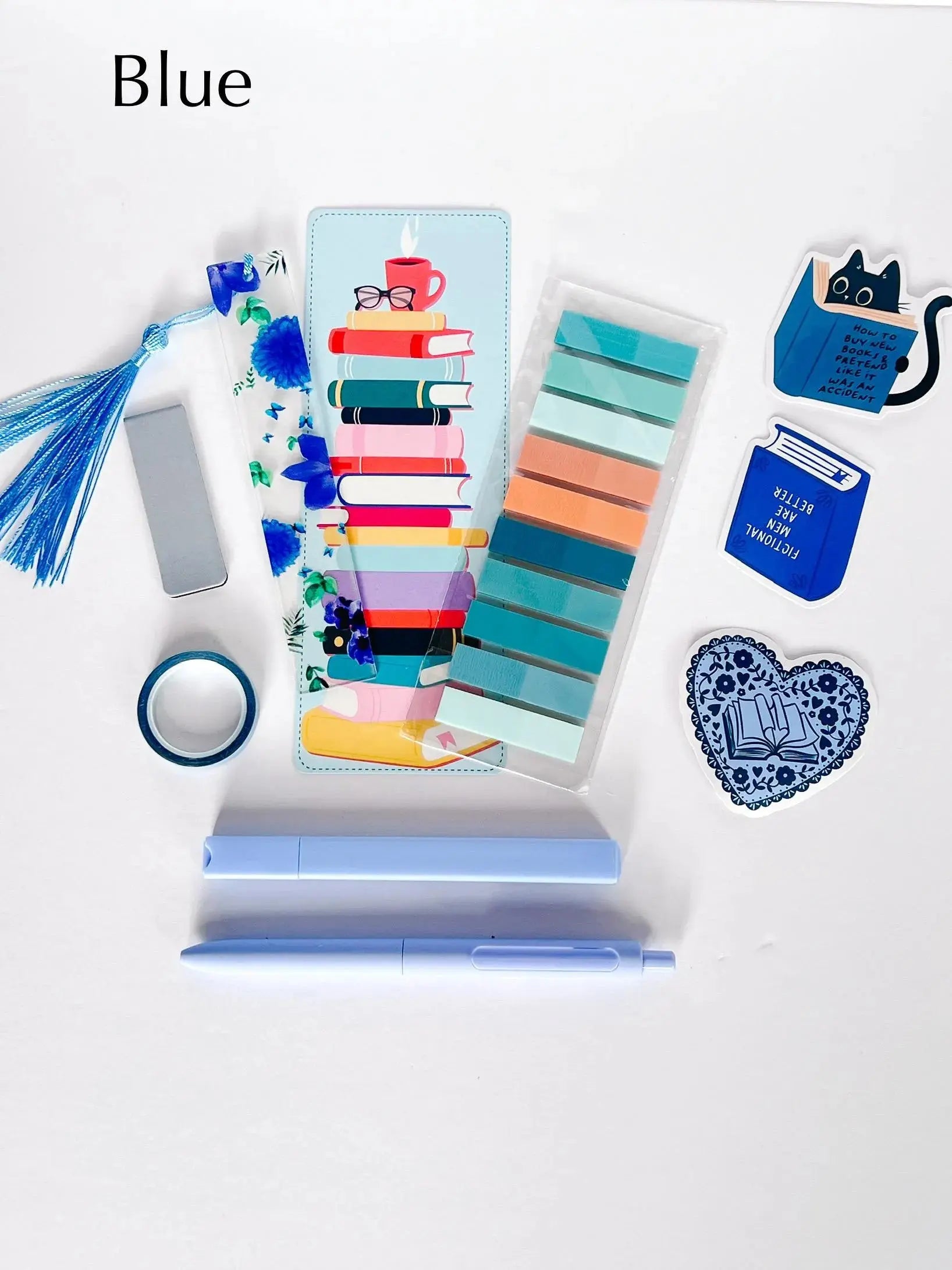 Flat lay of the Book Annotation Kit featuring highlighters, sticky notes, page tabs, pens, and other colorful tools for annotating and marking up books, all neatly arranged in a clear pouch."