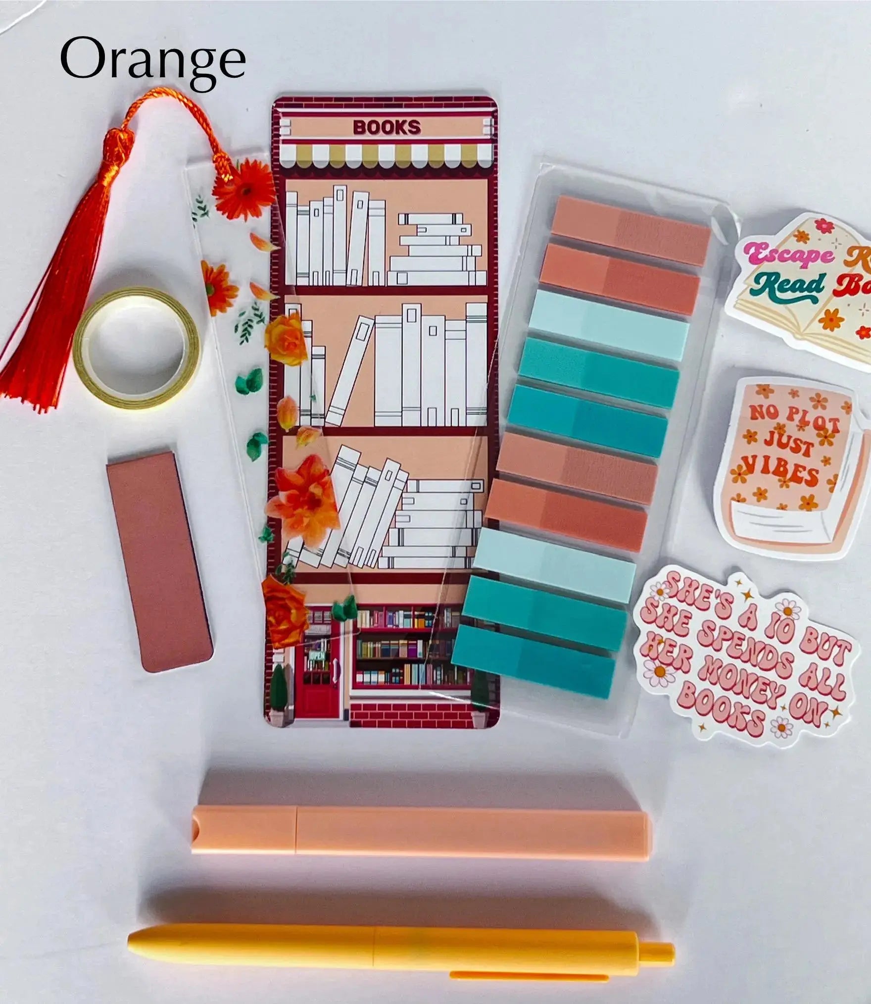 Flat lay of the Book Annotation Kit featuring highlighters, sticky notes, page tabs, pens, and other colorful tools for annotating and marking up books, all neatly arranged in a clear pouch."