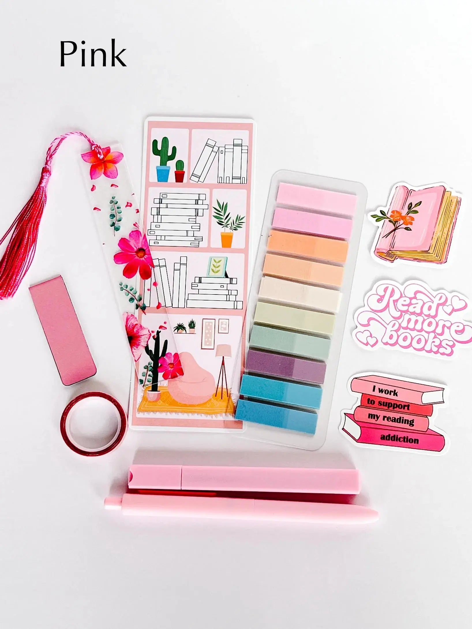 Flat lay of the Book Annotation Kit featuring highlighters, sticky notes, page tabs, pens, and other colorful tools for annotating and marking up books, all neatly arranged in a clear pouch."