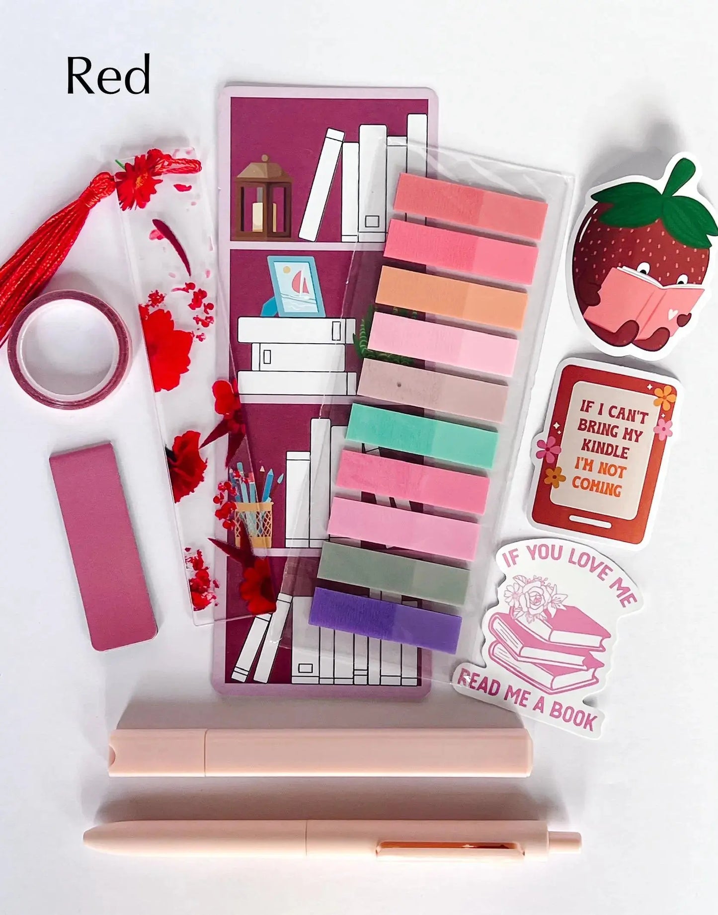 Flat lay of the Book Annotation Kit featuring highlighters, sticky notes, page tabs, pens, and other colorful tools for annotating and marking up books, all neatly arranged in a clear pouch."