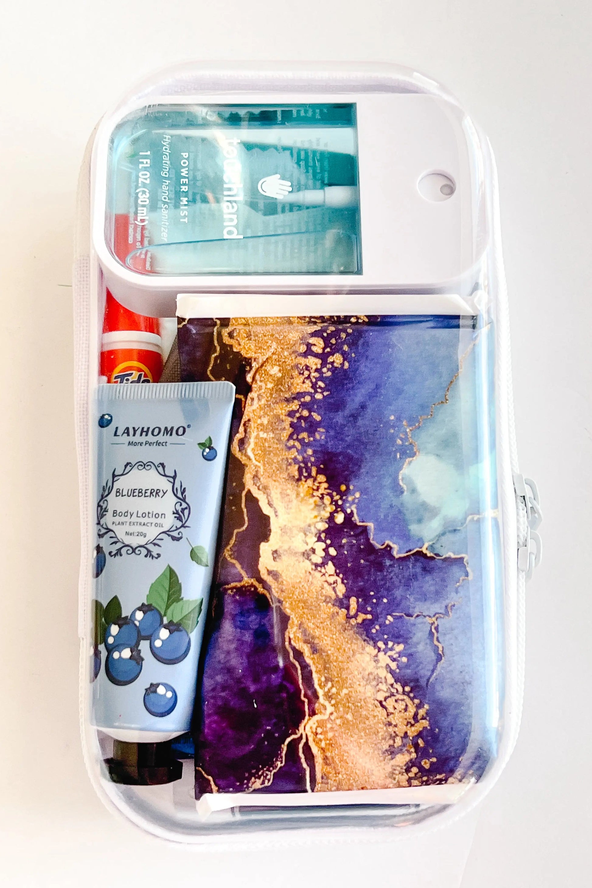 The Purse Pouch in blue colors– Compact Purse case with everyday essentials.
